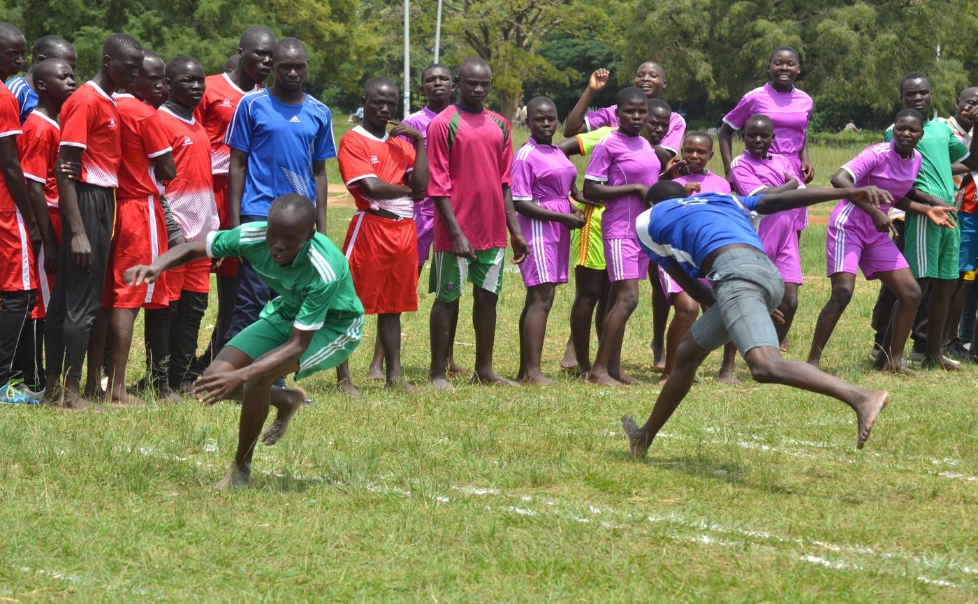 Pupils line up around the court during a Kho Kho schools competition in Soroti