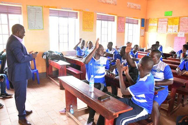 A trainer leads a classroom session