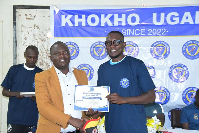 A certificate is presented to a participant