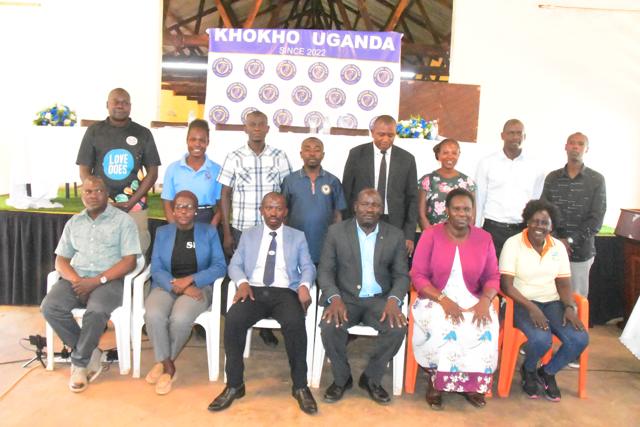 Guests seated before the banner