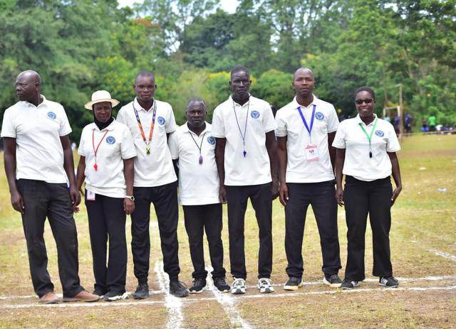 Match officials line up