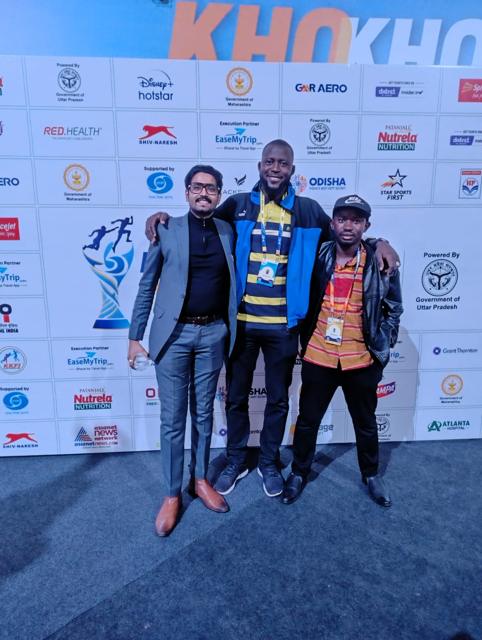 Members of the Uganda party at the World Cup backdrop