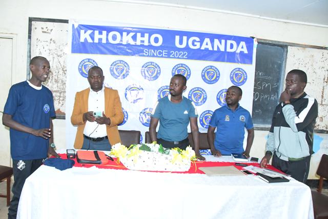 Officials at the table with flowers
